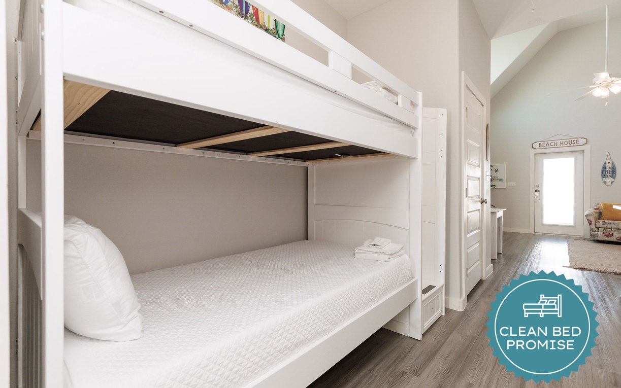 Your kids will love these built-in bunk beds with privacy panels and fresh linens, perfect for cozy nights after beach adventures.