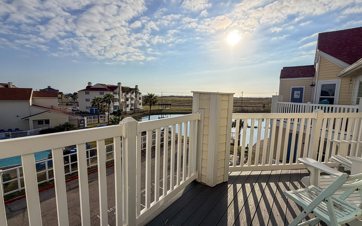 Step onto your private balcony and soak in stunning views of the surrounding coastal neighborhood, perfect for morning coffee or evening relaxation.