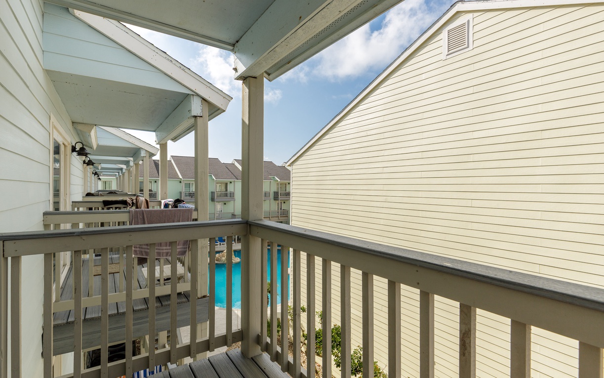 Step onto your private balcony and breathe in the fresh air while enjoying views of the sparkling pool below.
