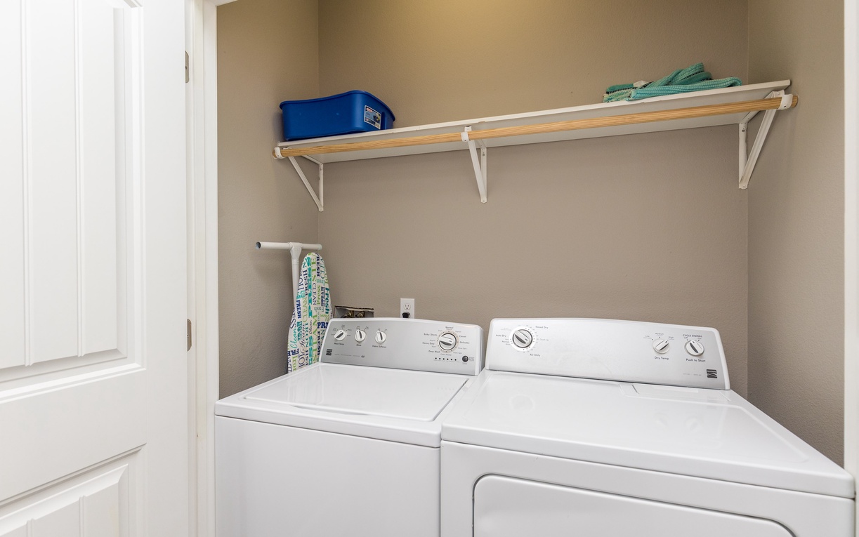 Your dedicated laundry space keeps your vacation wardrobe fresh with full-size washer and dryer plus convenient storage shelving.