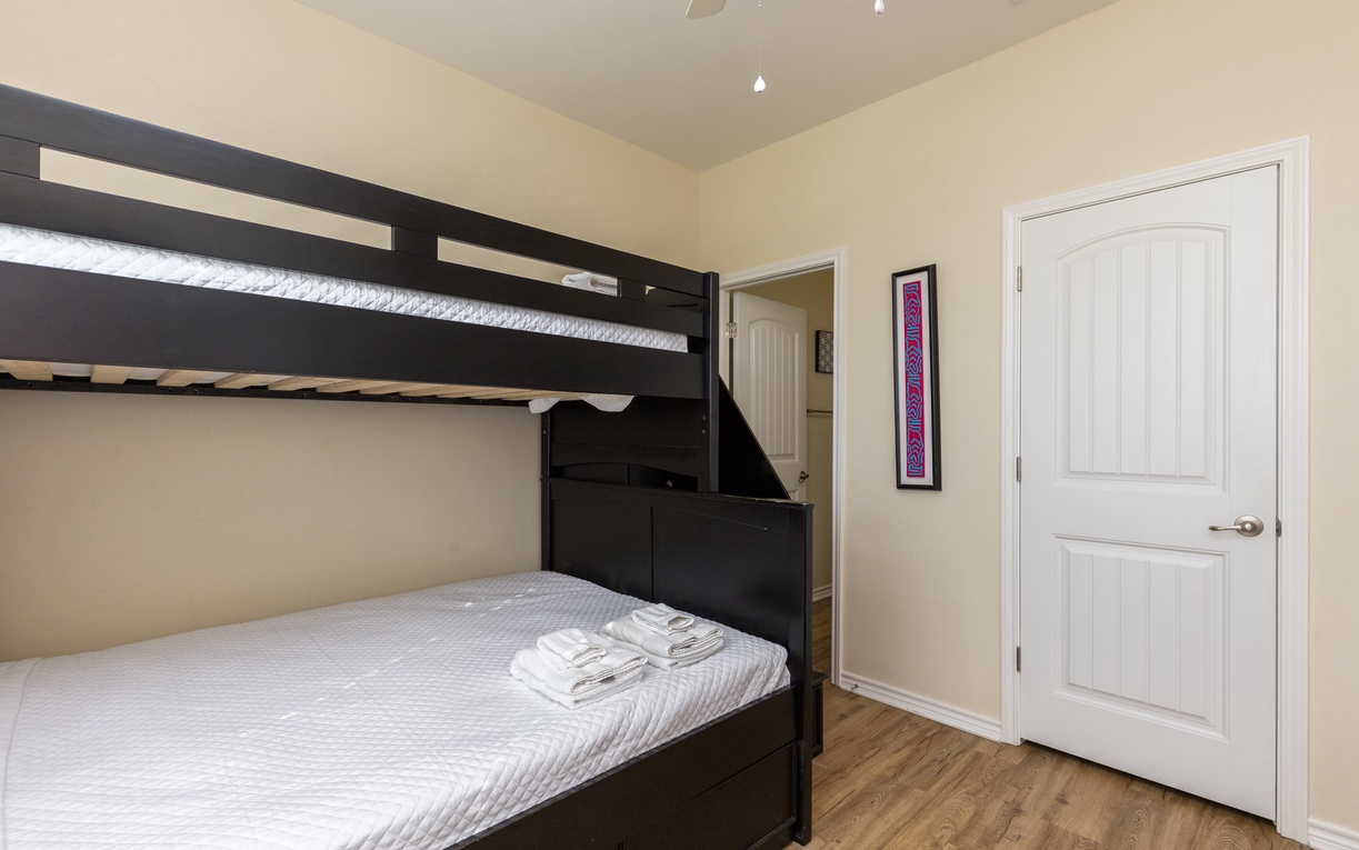 Your family will love this thoughtfully designed bunk room, where kids can claim their favorite spot and drift off to comfortable dreams.