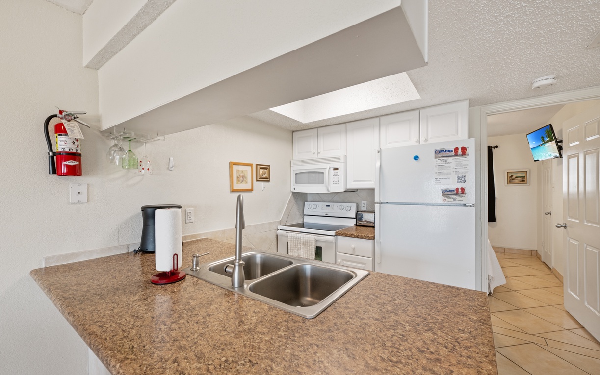 Your fully-equipped kitchen features granite countertops, stainless steel appliances, and everything you need to create memorable vacation meals together.