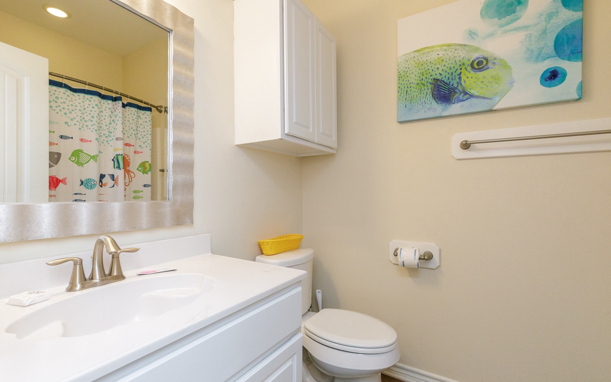 Second floor guest bathroom with a shower/tub combo