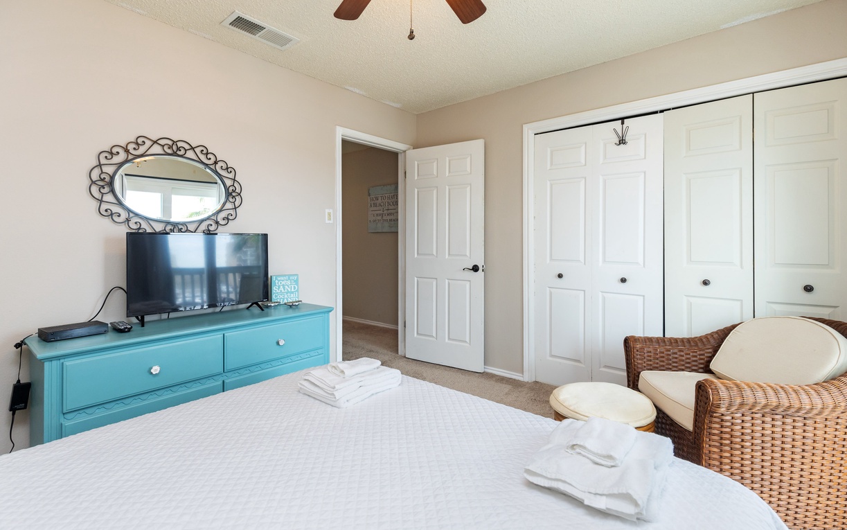 Your peaceful retreat features a comfortable bed, entertainment center, and cozy seating area with plenty of closet space.