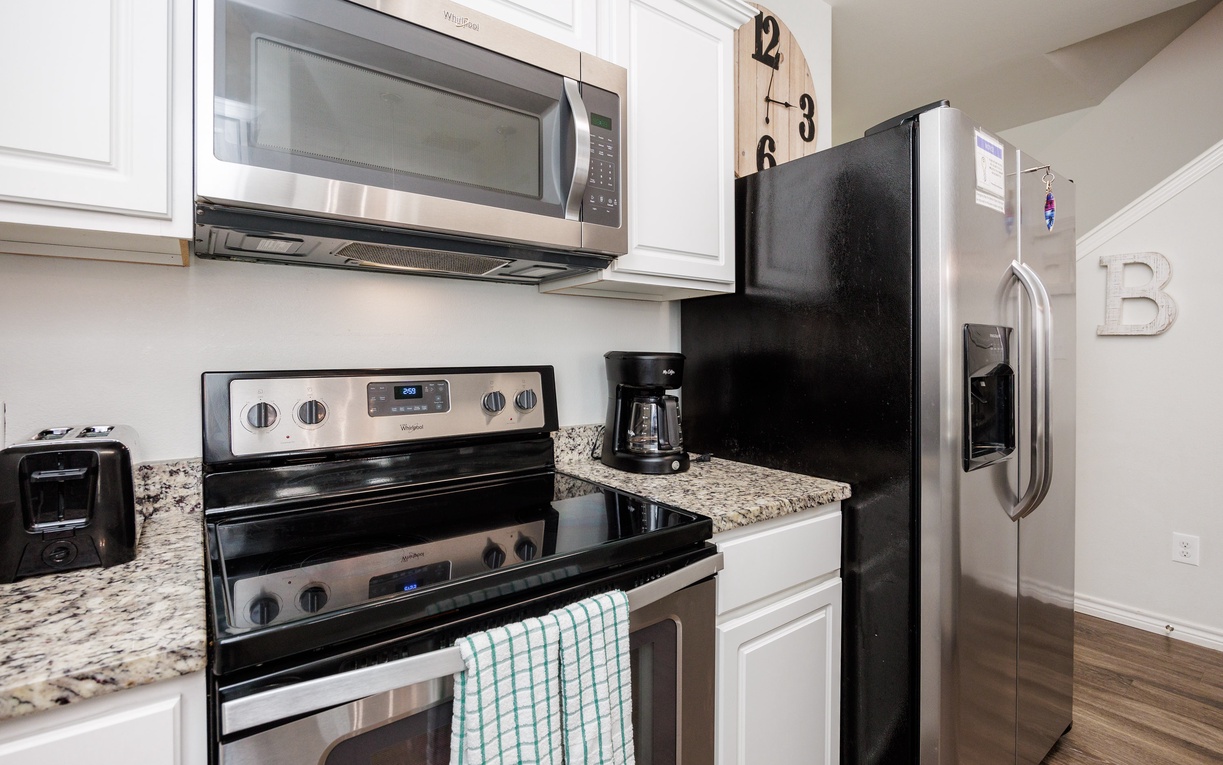 Your fully equipped kitchen features stainless steel appliances, granite countertops, and everything you need for home-cooked meals.