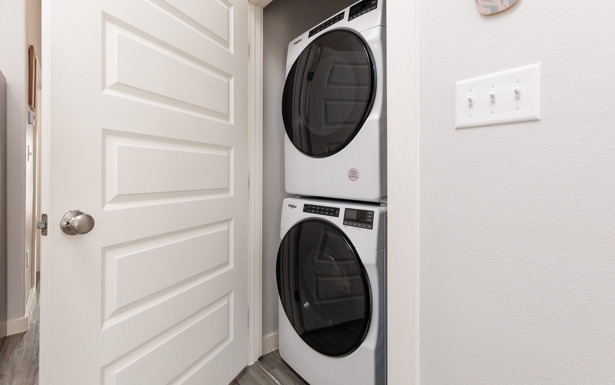 Keep your wardrobe fresh with convenient in-unit laundry facilities, tucked away in your private space for ultimate comfort.
