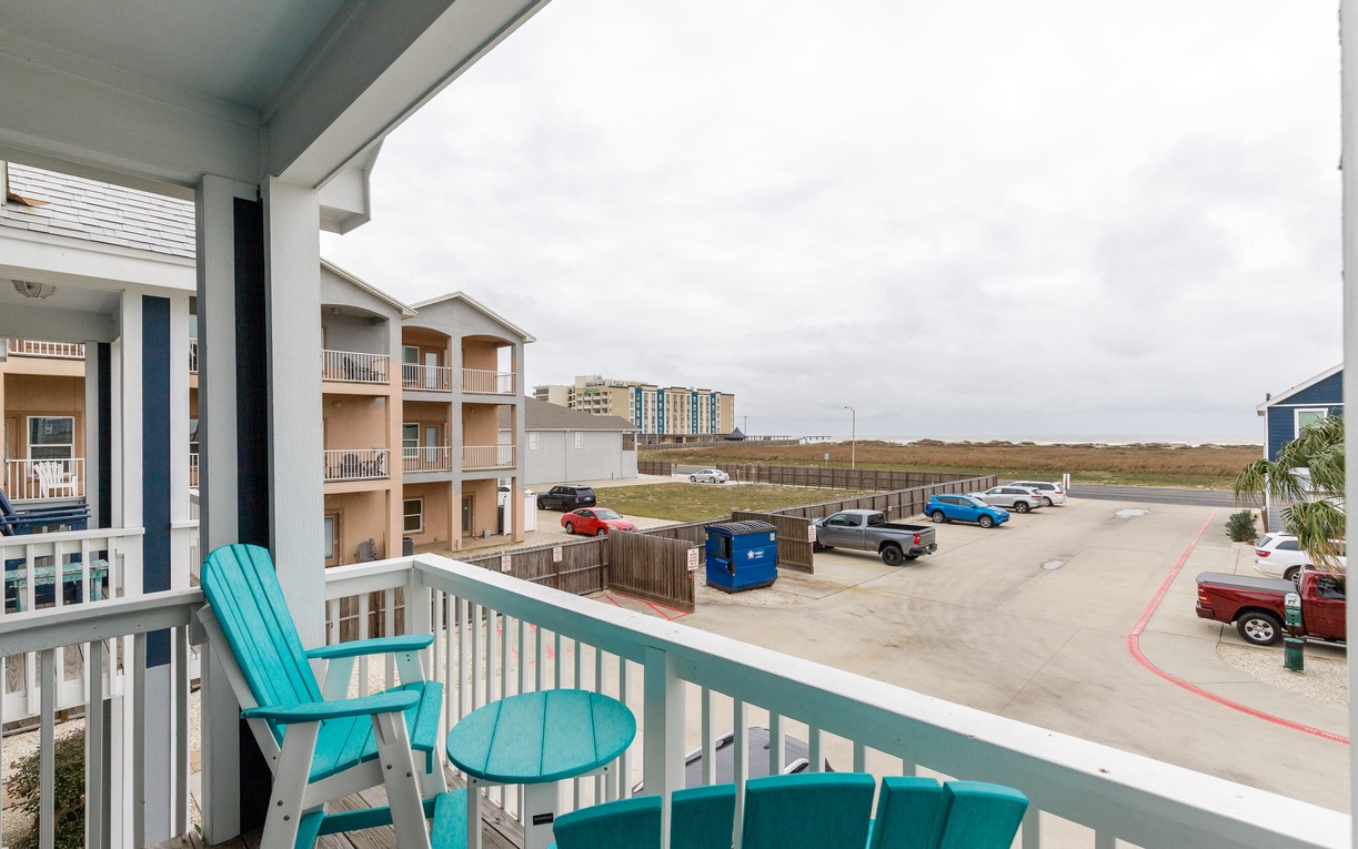 Second floor primary bedroom balcony with a view of the gulf.