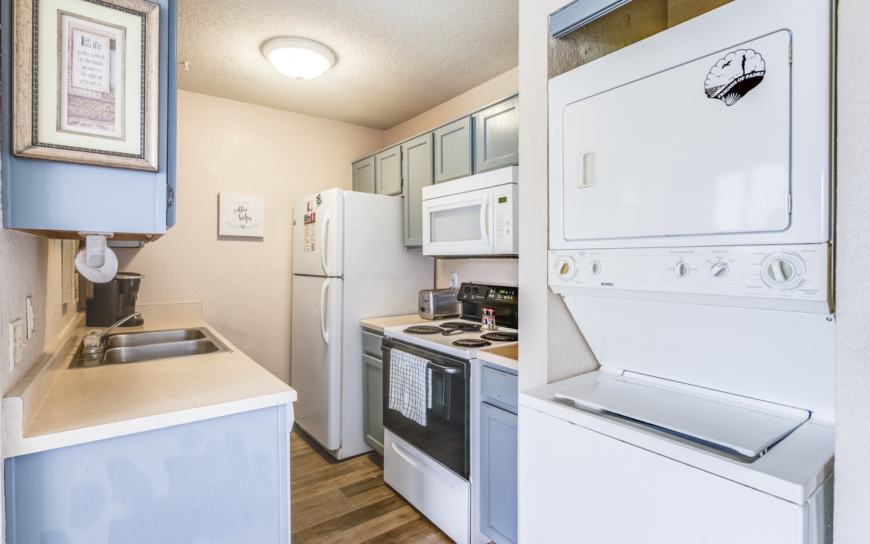 Your fully equipped kitchen features everything you need, plus convenient in-unit washer and dryer for effortless laundry during your stay.