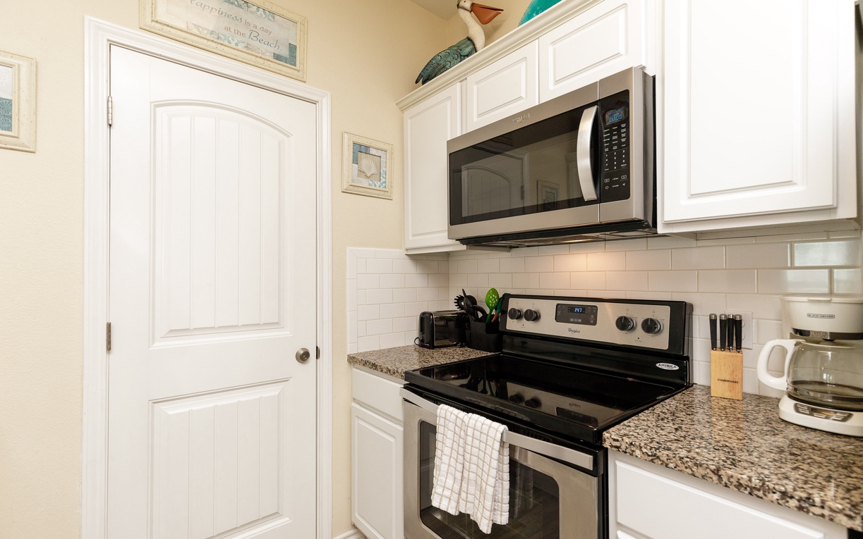 Your fully equipped kitchen awaits with granite counters, stainless appliances, and everything needed to prepare memorable meals together.