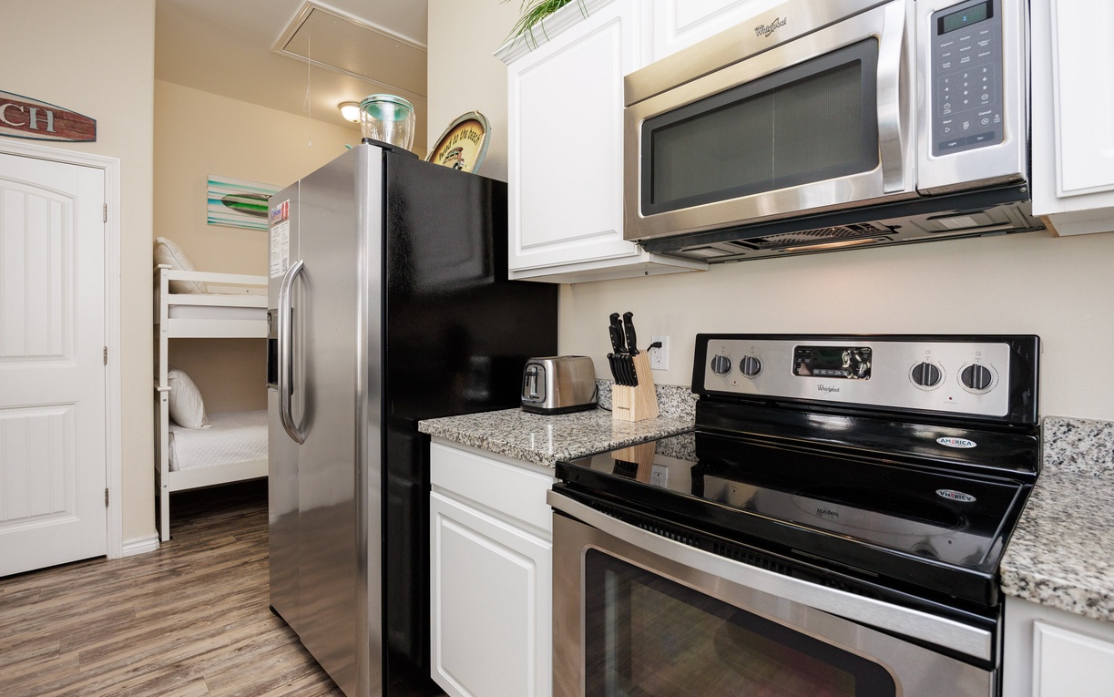 Your fully-equipped kitchen features granite countertops, stainless steel appliances, and everything you need to create memorable meals during your stay.