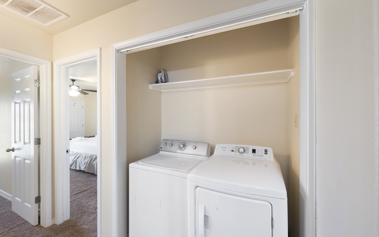 Your full-size washer and dryer make it easy to keep fresh clothes on hand throughout your stay, with convenient storage space above for laundry essentials.