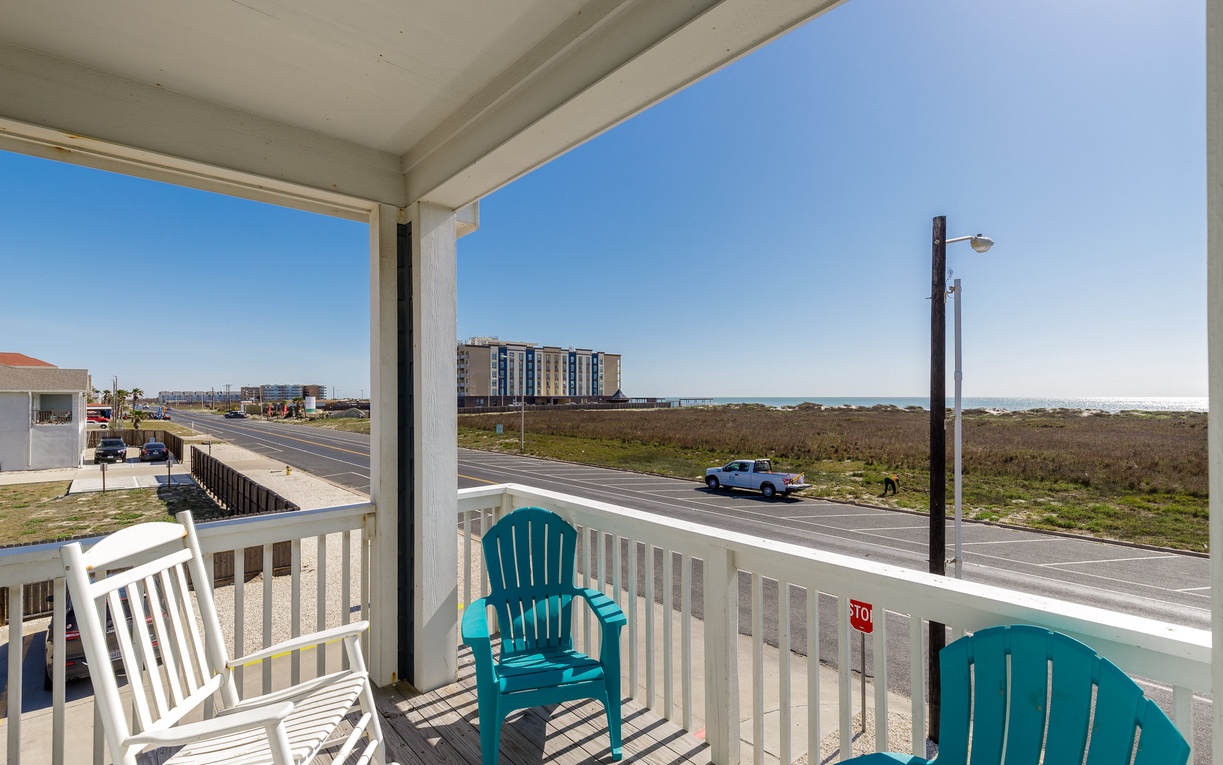 Relax on your primary bedroom's private balcony and enjoy coastal views and ocean breezes.