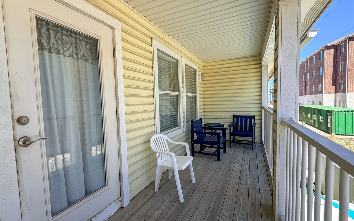 Step onto your private balcony with comfortable seating where you can enjoy peaceful moments and take in the neighborhood views.