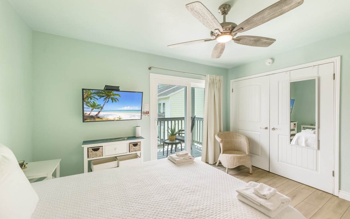 Wake up to calming coastal colors and step onto your private balcony—your serene retreat is complete with tropical breezes, a flat-screen TV, and thoughtful coastal décor.