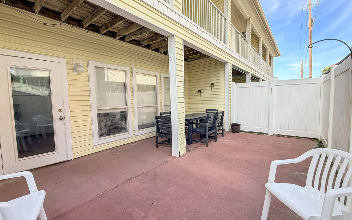 Your private patio offers peaceful moments with comfortable seating and secure fencing for complete relaxation.