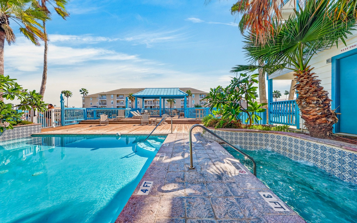 Soak up the sunshine at the sparkling community pool, complete with tropical palm trees, poolside loungers, and inviting outdoor spaces. Whether you're taking a refreshing swim or relaxing beneath the beautiful blue skies, vacation days don't get muc
