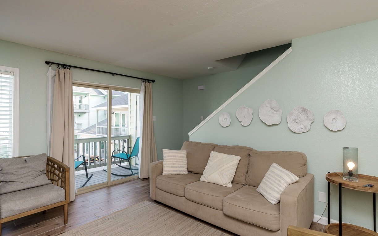 Relax in your coastal-inspired living room with sleeper sofa