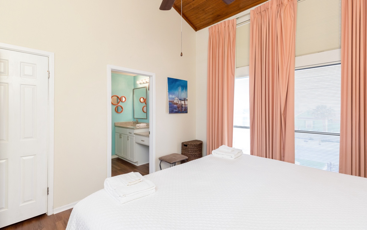 Drift off in your bright bedroom with a king size bed.