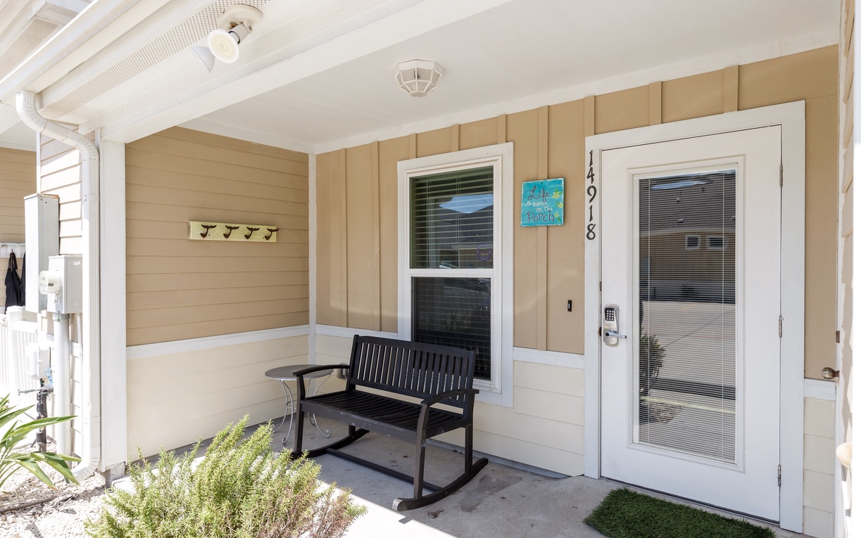 Step onto your private covered porch, where you can rock gently in the shade while sipping morning coffee or unwinding after beach adventures.