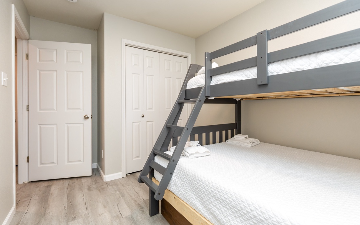 Sleep soundly in your cozy bunk bed retreat, complete with fresh linens and ample closet space for all your belongings.