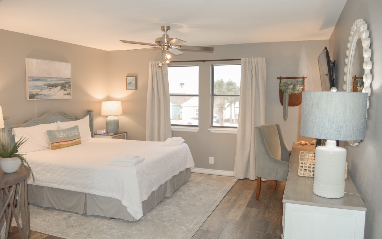 Your peaceful retreat awaits with coastal-inspired decor, plush bedding, and king size bed.