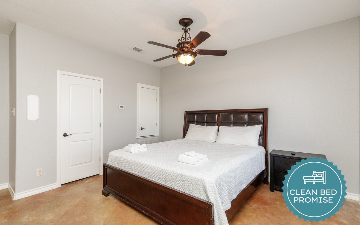 Settle into your comfortable bedroom with fresh linens and gentle ceiling fan breeze for peaceful nights.