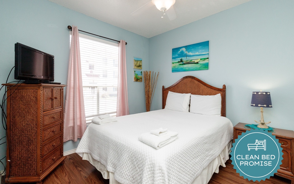Drift off in your coastal-inspired bedroom with tropical wicker furniture and soothing ocean views adorning the walls.