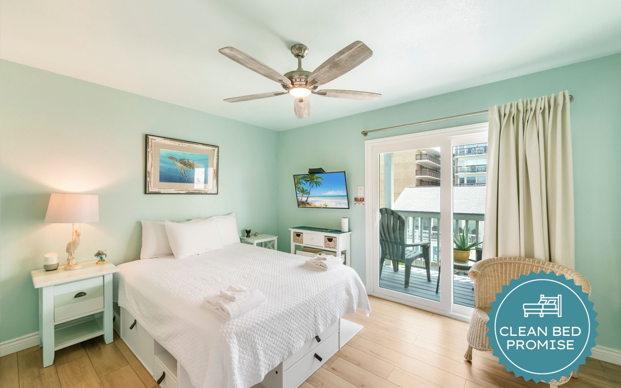 Wake up to soft sea breezes and soothing coastal hues in this serene bedroom retreat, where your private balcony awaits just steps from your bed.