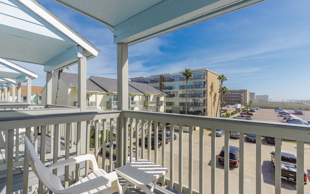 Your covered balcony offers comfortable seating with and a nice spot to people watch from.