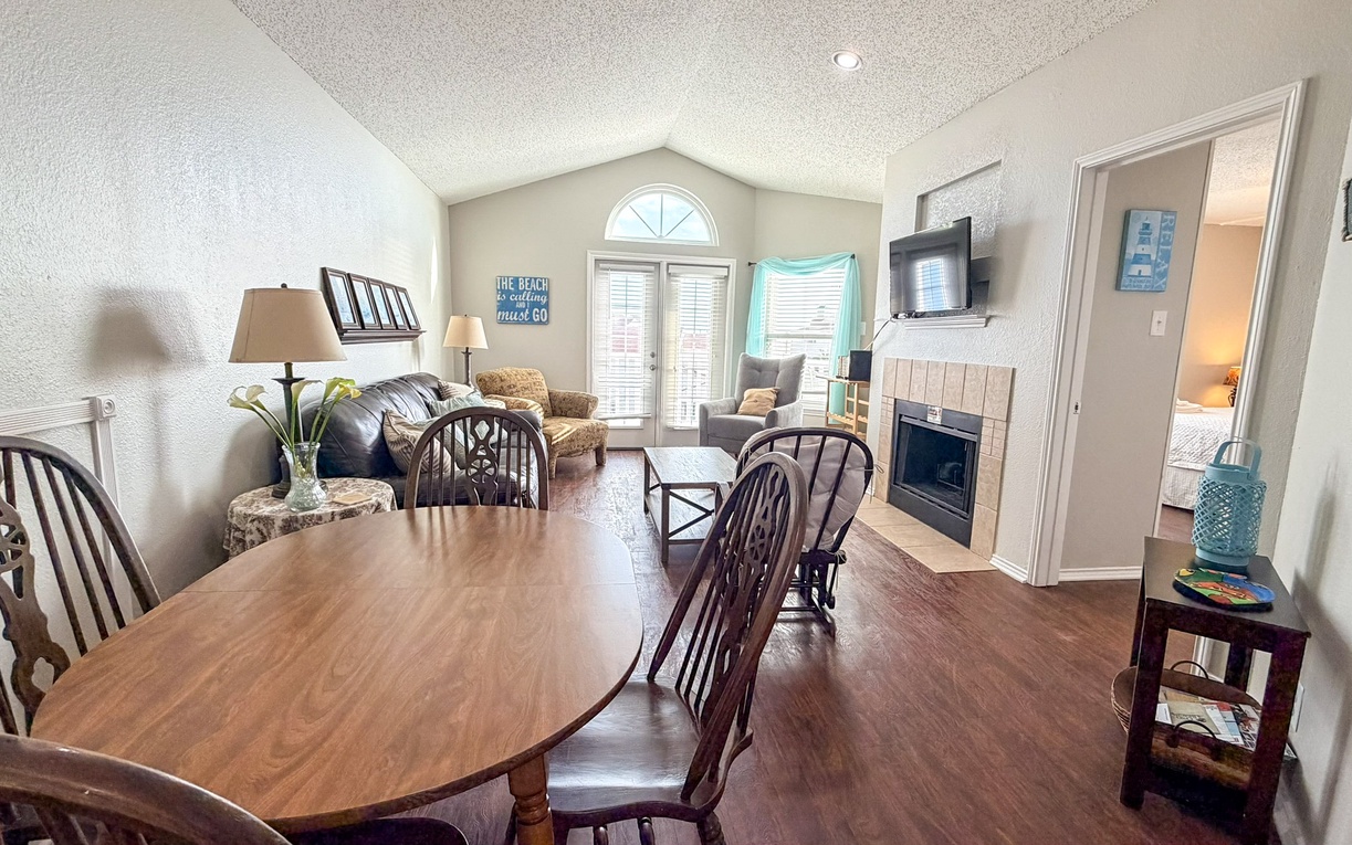 Your open-concept living space invites you to relax with cozy seating, a warm fireplace, and dining area perfect for memorable meals together.