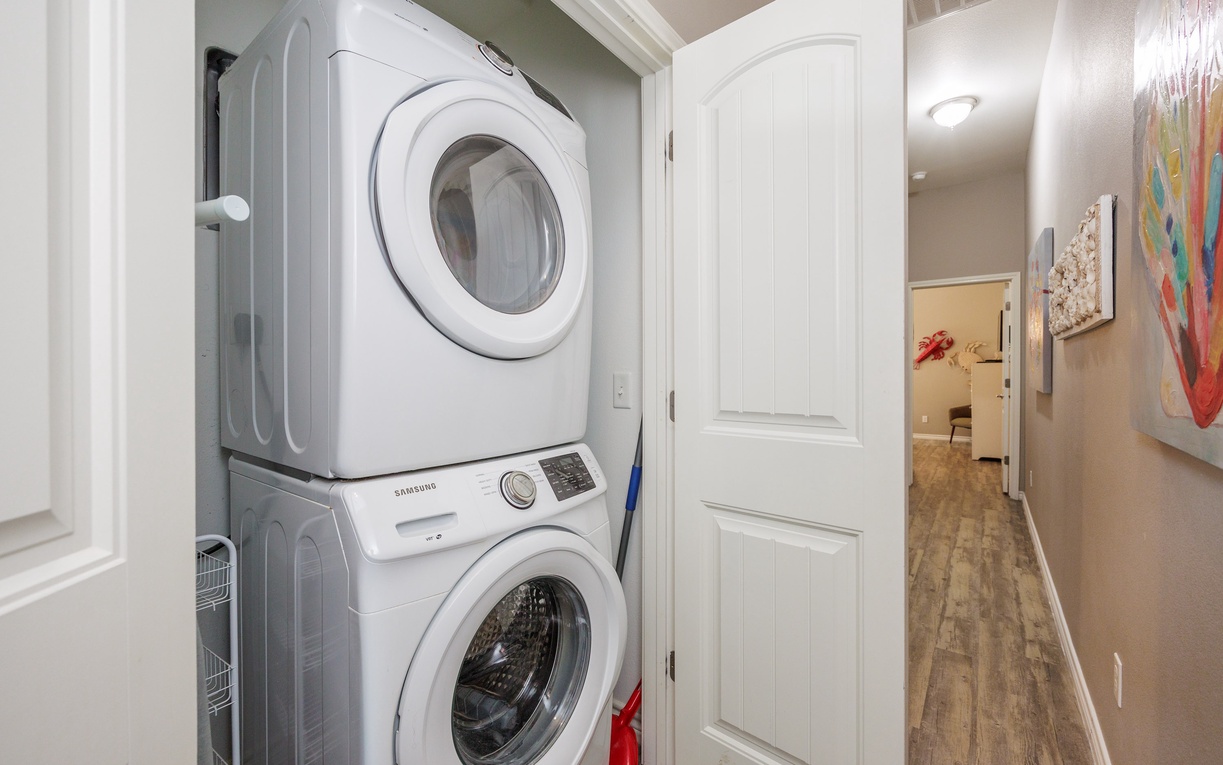 Your in-unit laundry makes extended stays effortless with full-size Samsung washer and dryer conveniently tucked in your hallway closet.