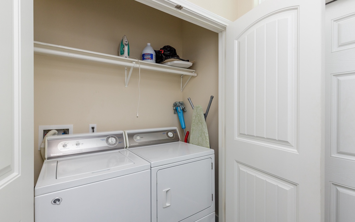 Your private laundry closet keeps your vacation wardrobe fresh, with convenient shelving for all your essentials.