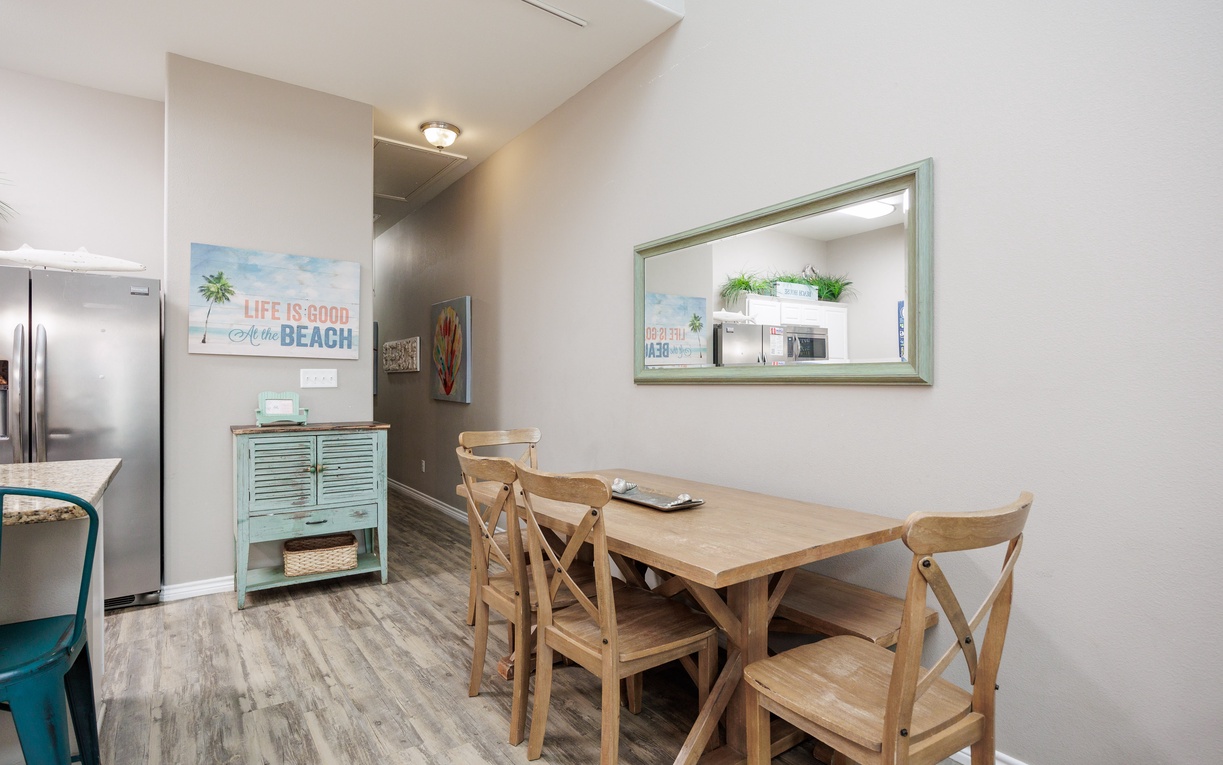 Gather around your spacious dining table for memorable meals with loved ones in this beautifully appointed space.
