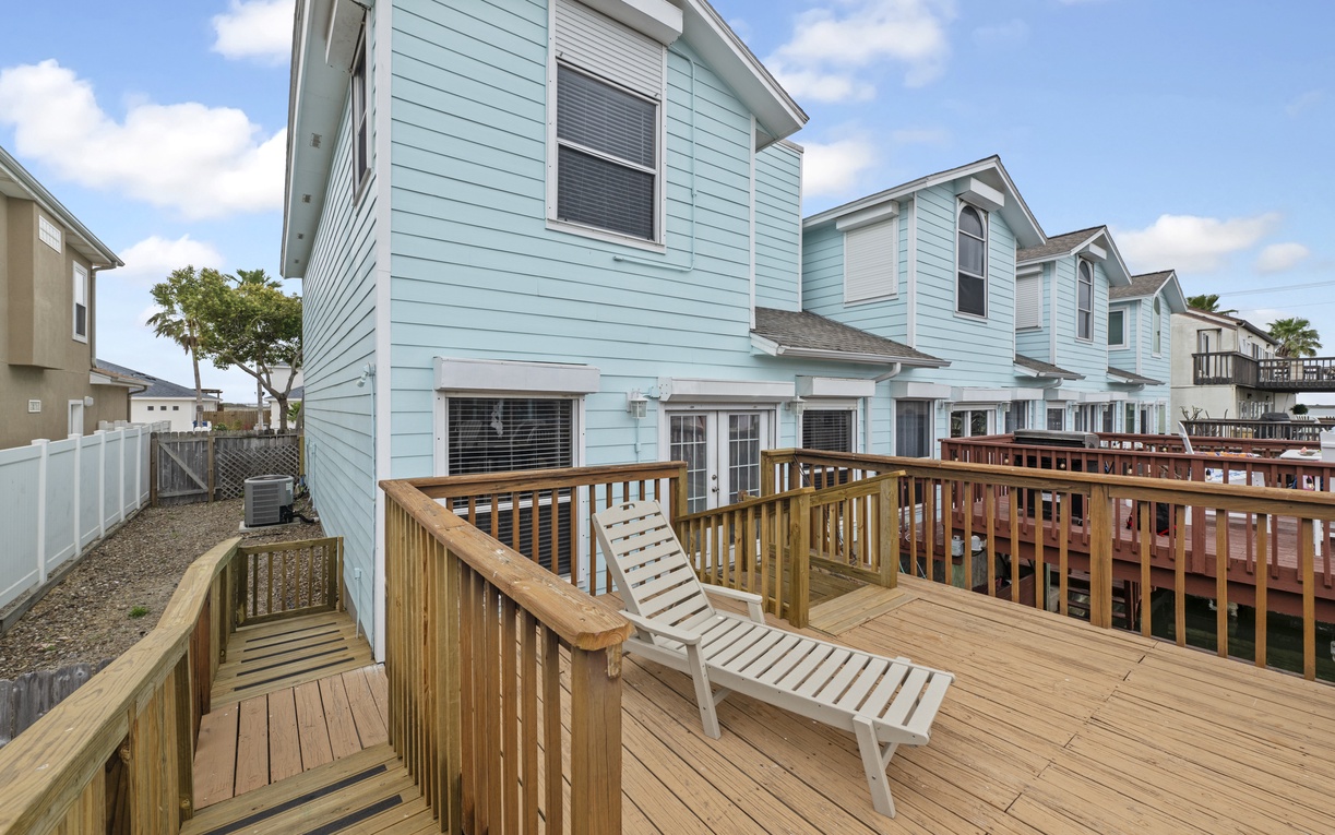 Your private deck awaits with comfortable lounge chairs where you can soak up the sun and enjoy peaceful moments outdoors.