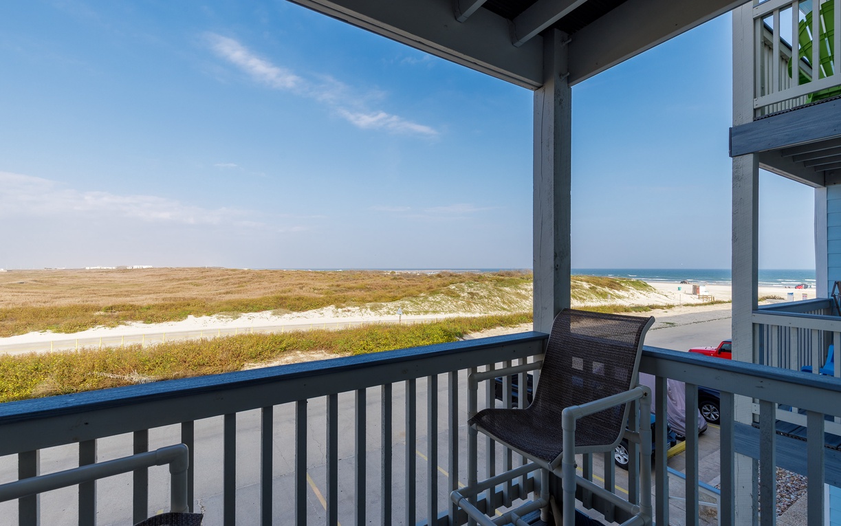 Your living area balcony offers breathtaking views of pristine beaches and rolling dunes, perfect for morning coffee or sunset relaxation.