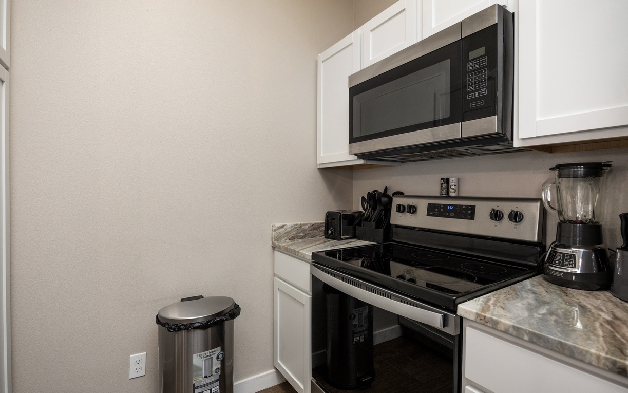 Your fully equipped kitchen awaits with stainless steel appliances, granite countertops, and everything you need to create delicious home-cooked meals during your stay.