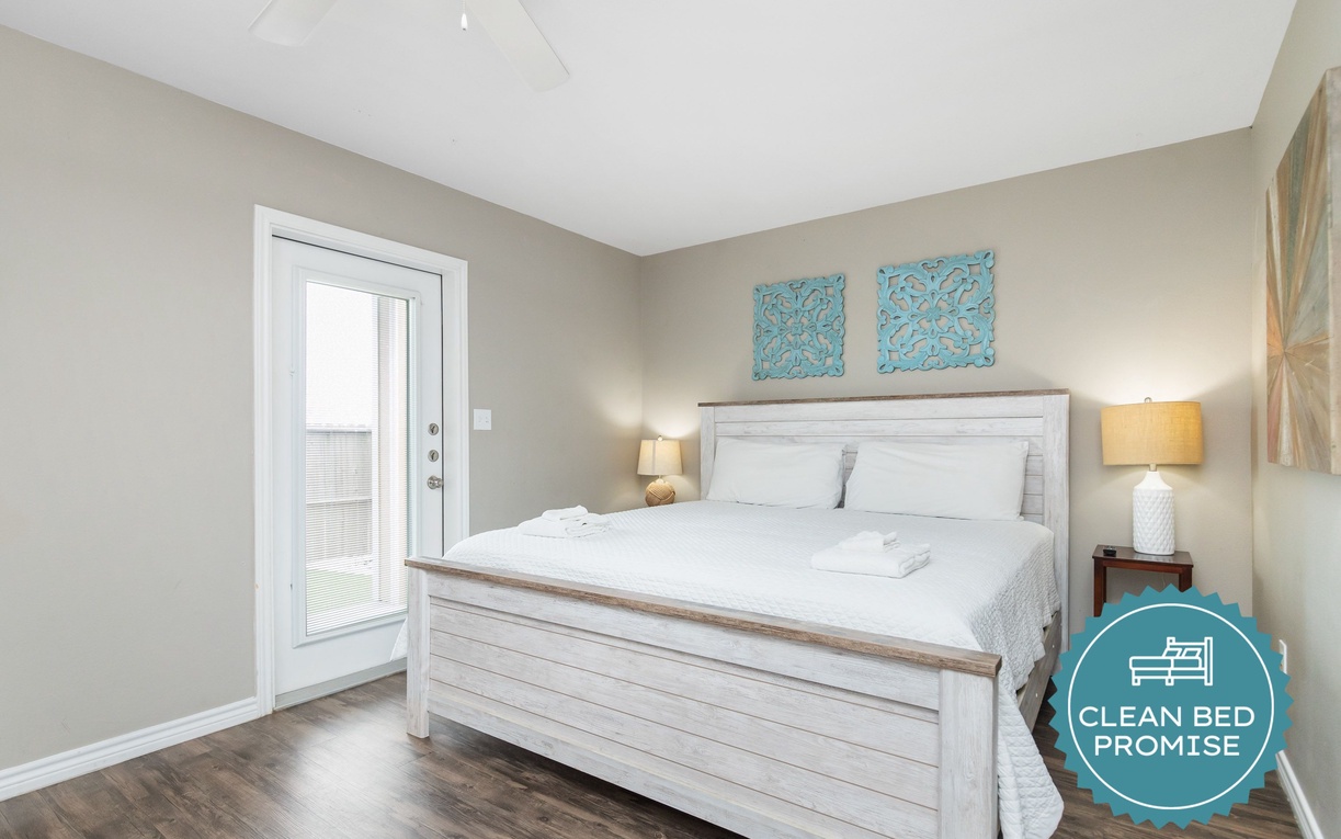 Sink into crisp white linens and enjoy the peaceful coastal-inspired decor in your beautifully appointed bedroom retreat.