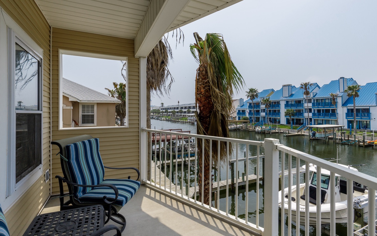 Your private waterfront balcony offers stunning marina views where you can sip morning coffee watching boats gently sway in the calm waters.