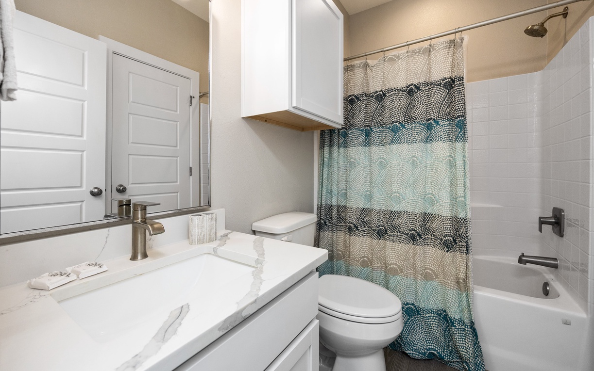 Your private bathroom features a relaxing tub-shower combo, perfect for unwinding after exploring the area.
