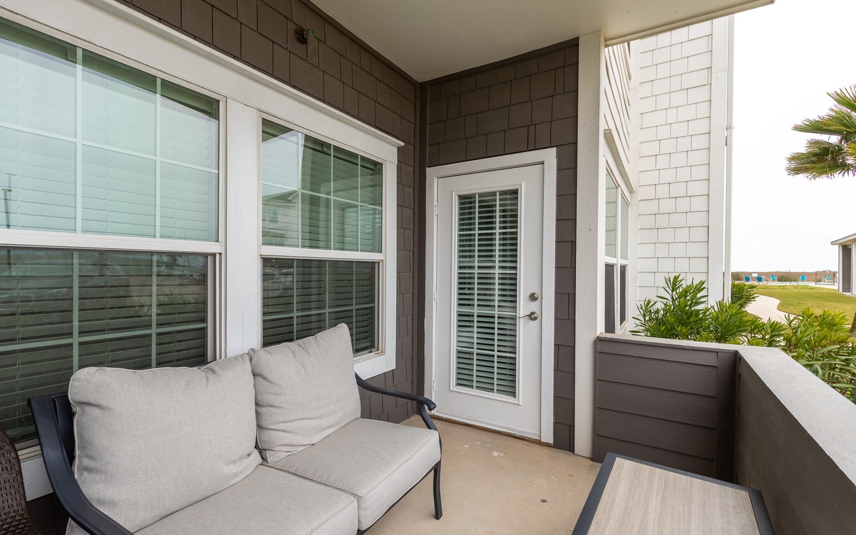 Step onto your private covered balcony and sink into plush cushions while enjoying peaceful moments outdoors.
