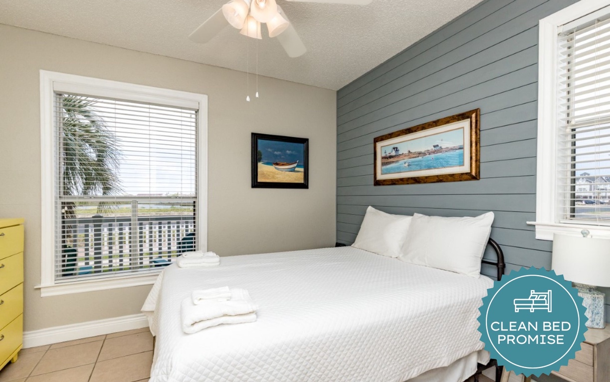 Drift off in coastal comfort with crisp linens and gentle ocean breezes through your window.