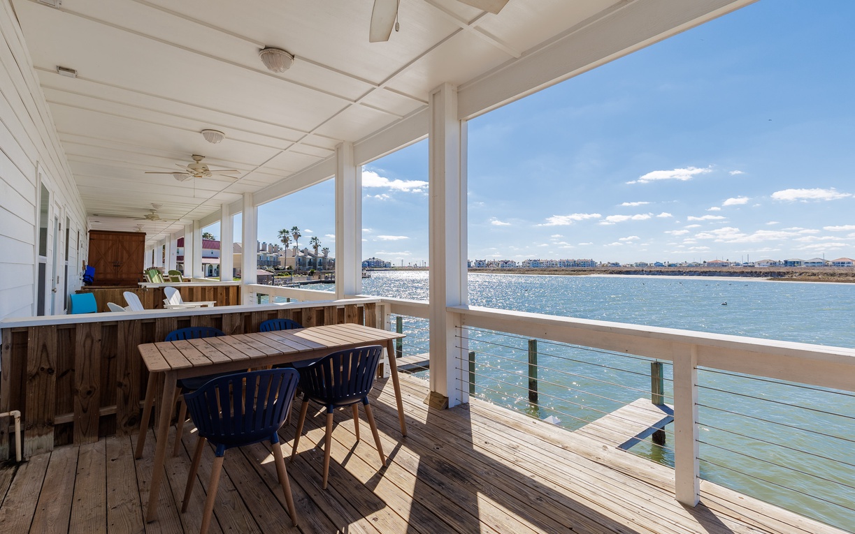 Your private waterfront dining deck offers stunning bay views and gentle breezes for memorable meals.