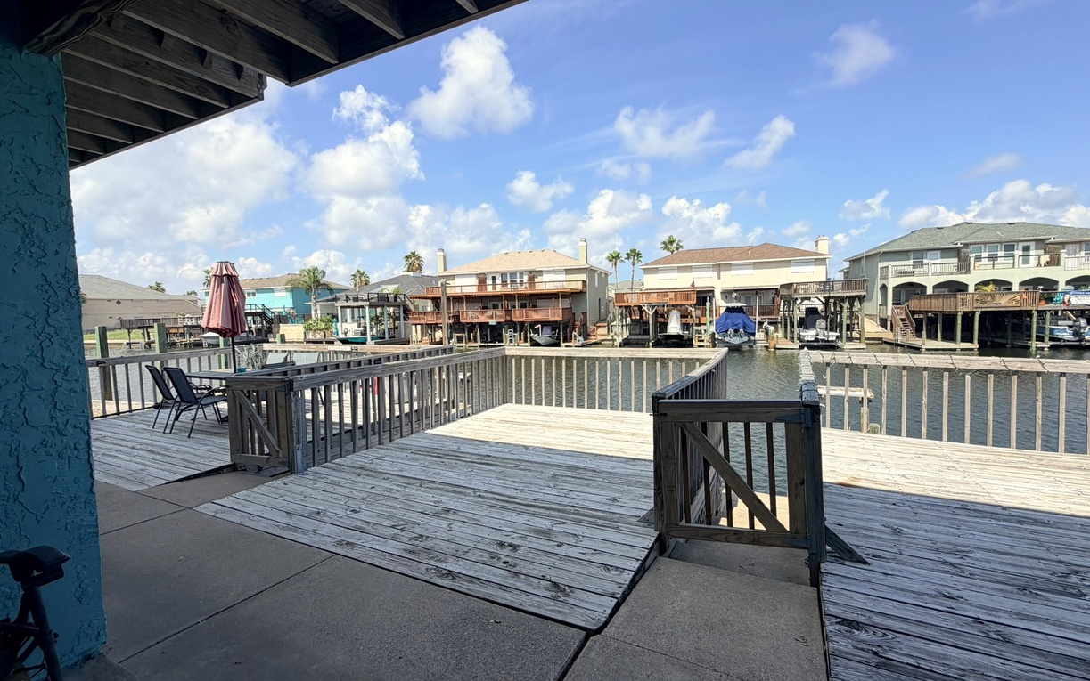 Step outside to your private waterfront deck and enjoy peaceful canal views and the laid-back coastal atmosphere.