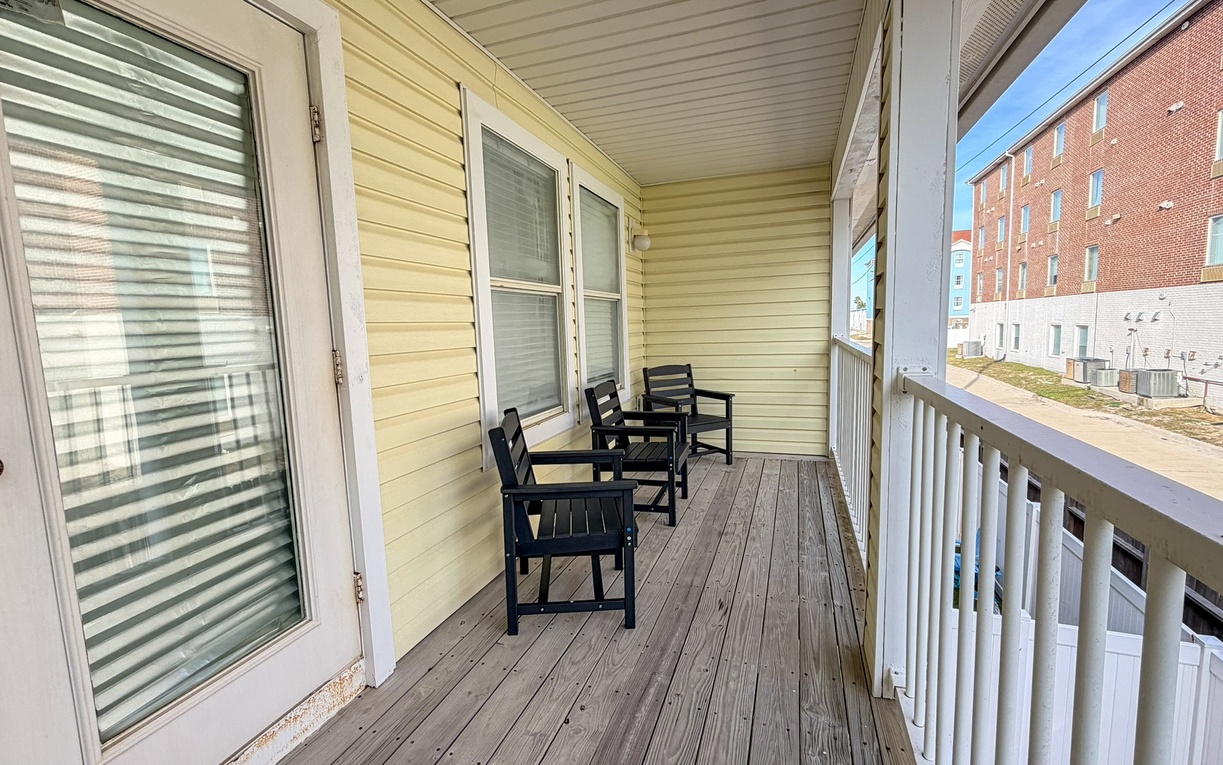 Your private balcony features comfy seating where you can sip morning coffee while enjoying the peaceful neighborhood views.