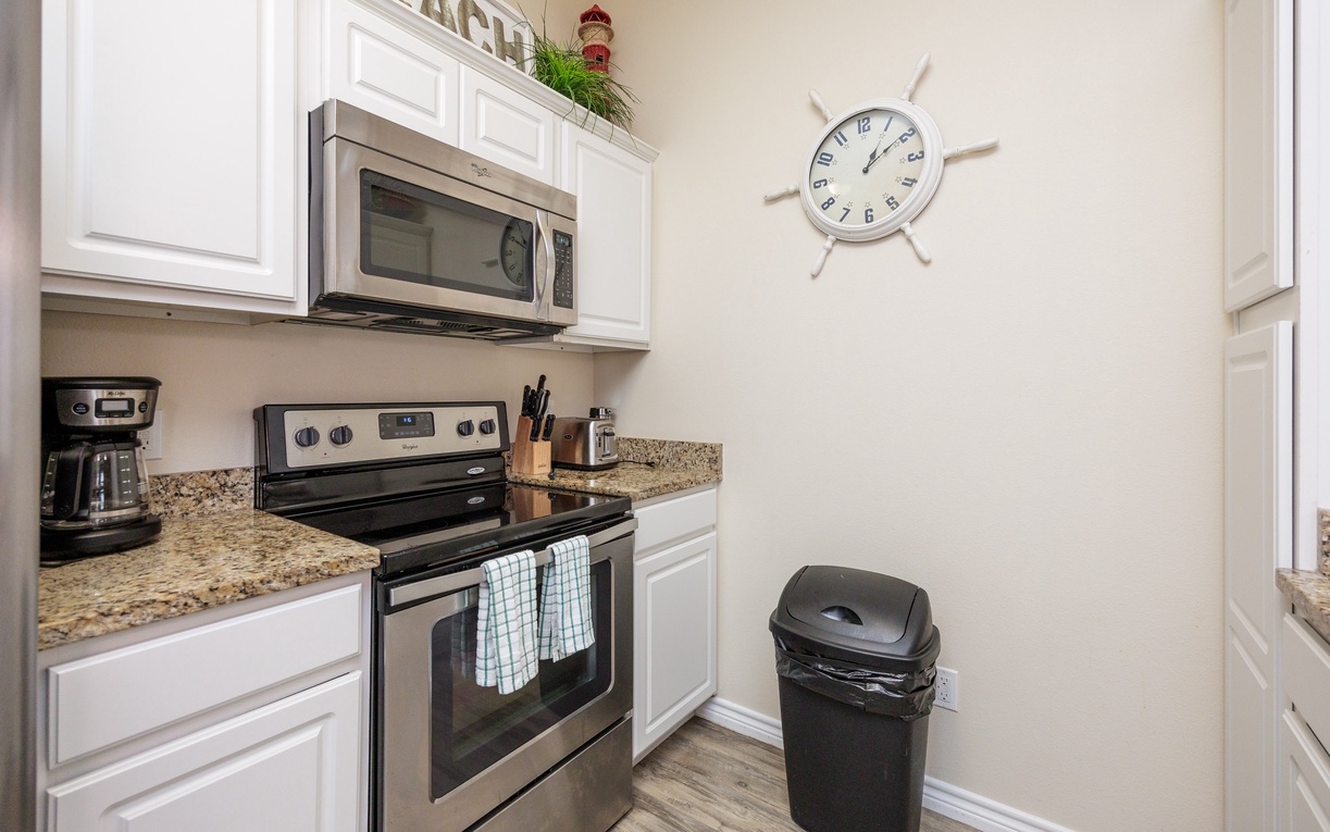 Your fully equipped kitchen awaits with granite counters, stainless appliances, and everything needed for home-cooked meals during your stay.
