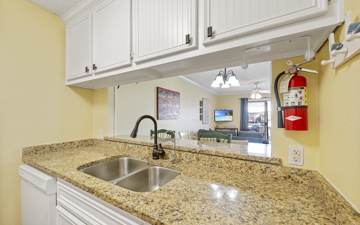Your granite-topped kitchen opens to the living area, perfect for preparing meals while staying connected with loved ones.