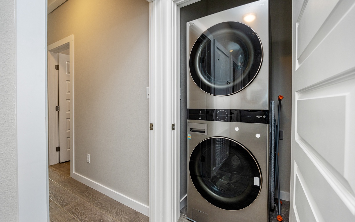 Your private stacked washer and dryer makes packing light effortless, tucked conveniently in a dedicated laundry closet.