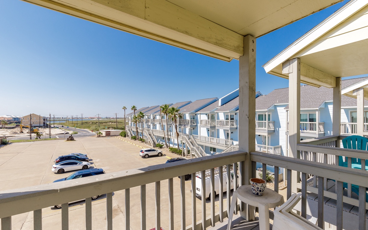 Step onto your private balcony and breathe in the coastal air while enjoying views of the beach community below.