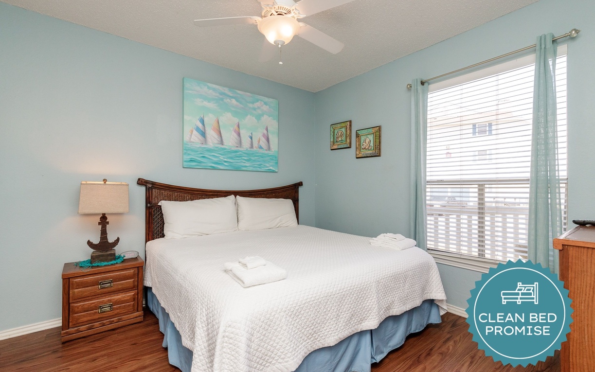 Your peaceful bedroom retreat features calming ocean colors and coastal charm, creating the perfect sanctuary for restful nights.