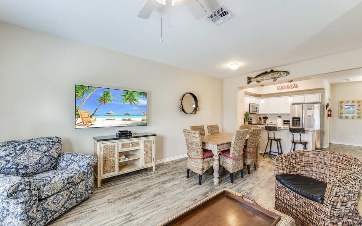 Your spacious open-plan living area flows seamlessly into the fully equipped kitchen, perfect for relaxing evenings and memorable meals together.